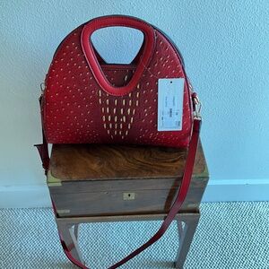 Classic Fashion lipstick red pleather handbag.